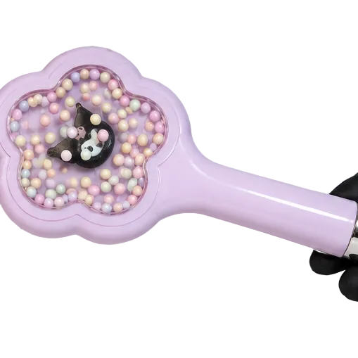 A lavender hand mirror with a flower-shaped back and a Kuromi character